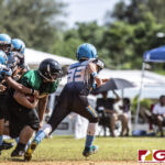 Guam Packers John Castro picks up a loose ball. The play was eventually called back for a down ball. (photo by Bout It Productions)