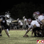 The Okkodo Bulldogs and The Simon Sanchez Sharks faceoff in Week One of the 2019 IIAAG High School Football Season. (photo by Bout It Productions)