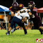 FD Friar Elijah Calvo, left, and Caleb Murphy swarm on Panther RB Julius Gadouang. (Photo by Michael Blas)