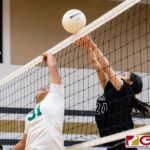 Tiyan Titan Giana Quichocho gets her hands on a tip ball from Islanders Hannah Hular. (Photo by Michael Blas)