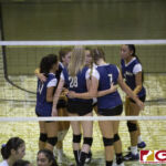 The Guam High Panthers talk it over after trailing the Notre Dame Royals. (photo by Bout It Productions)