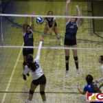 Guam High Panthers Sofia Cunningham & Ashley
Dill go up against Notre Dame Royals Minami Rabago. (photo by Bout It Productions)