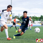 Guam Matao Captain Jason Cunliffe brings the ball out from the box while Philippines Yrick Gallantes looks to regain possession. (Photo by Michael Blas)