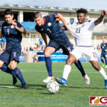 Guam's Shane Malcolm fights through the defense to a shot attempt in the second half. (photo by Michael Blas)
