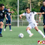 Guam Matao Forward Marcus Lopez controls the ball against Philippines Mikel Baas. (Photo by Michael Blas)