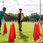 GW Gecko Kristian Versario comes in third for his team with a final time of 20:34. (Photo by Michael Blas)