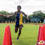 GW Gecko Terrance Johnson finishes first place overall with a time of 16:30. (Photo by Michael Blas)