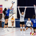 ND Royal Austia 'T.N.T' Mendiola goes in for a tip ball over Cougars Jaeana Reyes and Rebecca Salas. (Photo by Michael Blas)