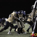 GW Geckos Keanu Gray protects the ball while getting through the defense for the score. (photo by Bout It Productions)