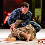 Navy vs. Army: Active Duty Navy Member Maxton Soviak defeats Army's Rico Respicio via Kimura. (Photo by Michael Blas)