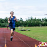St. Paul Warrior Kanta Yamazaki finishes first overall with a time of 18:41. (Photo by Michael Blas)