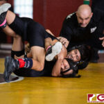 High School wrestlers hit the mats in a Preseason Tournament held at the FD Jungle. (photo by Bout It Productions.)