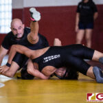 High School wrestlers hit the mats in a Preseason Tournament held at the FD Jungle. (photo by Bout It Productions.)