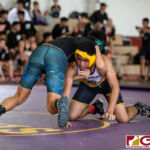 High School wrestlers hit the mats in a Preseason Tournament held at the FD Jungle. (photo by Bout It Productions.)