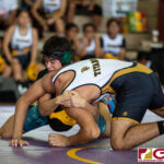 High School wrestlers hit the mats in a Preseason Tournament held at the FD Jungle. (photo by Bout It Productions.)