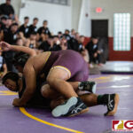 High School wrestlers hit the mats in a Preseason Tournament held at the FD Jungle. (photo by Bout It Productions.)