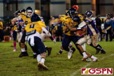 Guam High Panther Izaak Castro wraps up Gecko RB Aiden Gumataotao for no gain on the play. (Photo by Michael Blas)
