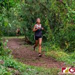 Sanchez Shark Marie Gatbonton runs through the jungle trail of the race. (Photo by Michael Blas)