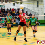 St. John's Knight Nikki Mathews passes the ball around in the first set of the game. (Photo by Michael Blas)