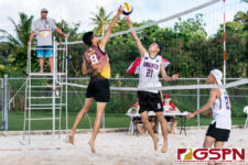 FD Friar Jeremiah Nguyen gets up for a big block in the first set of the match. (Photo by Michael Blas)