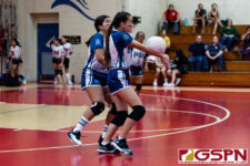 St. Anthony Raider Ha'ani Byerly passes the ball around in the first set of the game. (Photo by Michael Blas)
