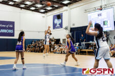 St. Paul Warrior Kirsten Silva fires from deep in the second quarter of the game. (Photo by Michael Blas)