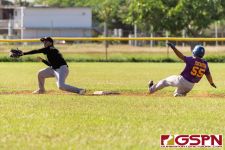 GW Gecko Ash Tedtaotao slides into second base as Islander Malcolm Pangelinan misses the catch. (Photo by Michael Blas)