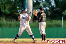 ND Royal Nolan Cruz cheers his team on after making it to second base off a JFK error. (Photo by Michael Blas)