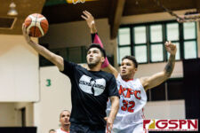 Wu Tangs Amir Khozhlev goes in for a lay up in the first quarter of the game. (Photo by Michael Blas)