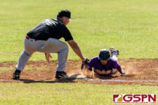 GW Gecko runner makes it safely back to first base before Islander Vince Camacho can get to him. (Photo by Michael Blas)