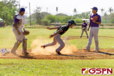 JFK Islander Gavin Lim celebrates after scoring his teams first point of the matchup. (Photo by Michael Blas)
