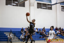 ND Royals JV Joshua Meno takes it to the rim after hustling down court. ( Photo by Bout It Productions )