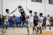 ND Royals JV Aidean Leon Guerrero goes airborne through the defense. ( Photo by Bout It Productions )