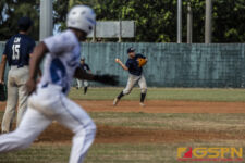 Team Guam's Shon Muna throws to first for the final out of the inning. ( photo by Bout It Productions )
