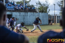 Team Guam's Alejandro Diaz gets caught looking at the plate from a pitch by Team Pohnpei. ( photo by Bout It Productions )