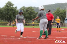 JFK's Kiyonii Yamaguchi is celebrated at home after hitting a two-run home run in the 2nd inning. (photo by Robert Balajadia)