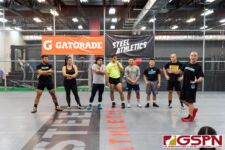Terry Debold introduces Guam's wrestling stars who gathered at Steel Athletics for a meet and greet and to teach athletes a few moves to help improve their skills. From left to right: Jose Cruz, Maria Dunn, Pavin Blas, Nainoa Calvo, Cyril Maravilla, Kaleo Gamboa, and Mike Shinohara. (Photo by Michael Blas)