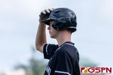 New Zealand's Emile Nel makes his way at bat. (Photo by Michael Blas)