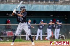 New Zealand's Bunji Nalcao gets set to in the second inning. (Photo by Michael Blas)