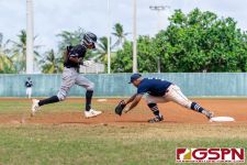 Guam's Nolan Cruz outs New Zealand's Bunji Nalcao at first base. (Photo by Michael Blas)
