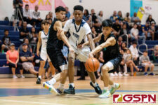 Southern Dolphin Elijah Cruz strips the ball off of Guam High Panther Tobias Eckles. (Photo by Michael Blas)