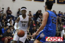 Panther Tobias Eckles uses a gather before a shot attempt in the first half. (photo by Robert Balajadia)