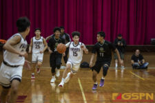 FD Friars Nathan Perkins-Puesser dripples down court against the JFK Islanders. ( photo by Bout It Productions )