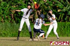Academy Cougar Isabella Saville slides safely into second base. (Photo by Michael Blas)