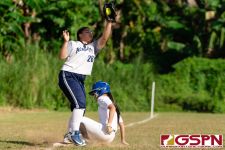 A Southern Dolphin player steals third base. (Photo by Michael Blas)