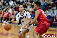 FD Friar Raymond Castro dishes the ball out in the fourth. (Photo by Michael Blas)