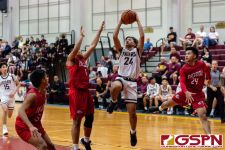 FD Friar Blaise Ada gets up under the basket for two points in the fourth quarter. (Photo by Michael Blas)