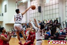 Okkodo Bulldog Lenard Baul gets fouled under the basket. (Photo by Michael Blas)
