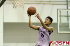 Sanchez Shark John Macaldo attacks the basket on a fast break in the second quarter. (Photo by Michael Blas)