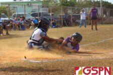 Cougar catcher Almiah Cruz makes the tag on a sliding Rocki Mesa for an out in the 2nd inning. (photo by Robert Balajadia)